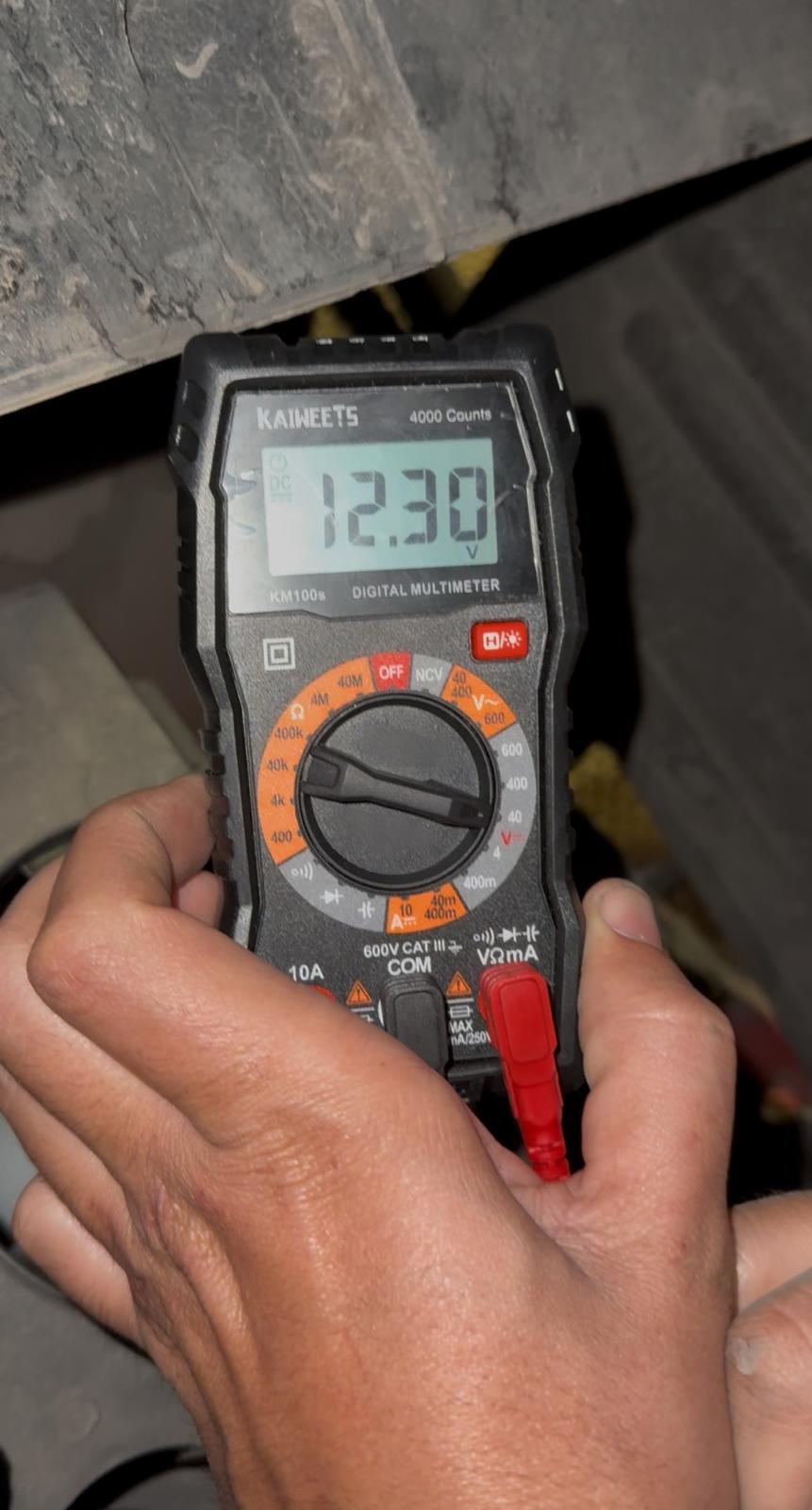 Truck mechanic inspecting commercial vehicle Austin TX
