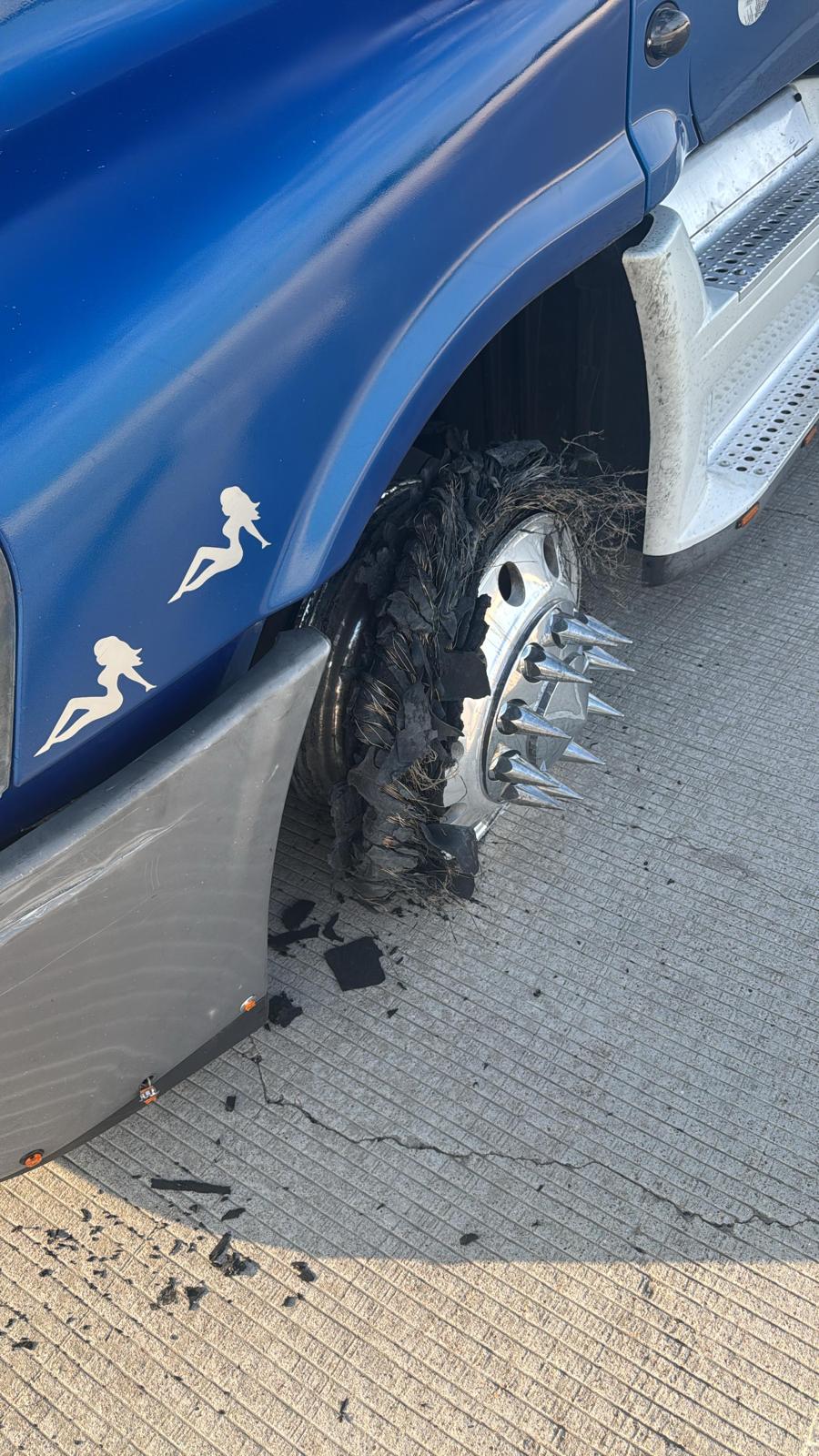 Truck mechanic inspecting commercial vehicle Austin TX