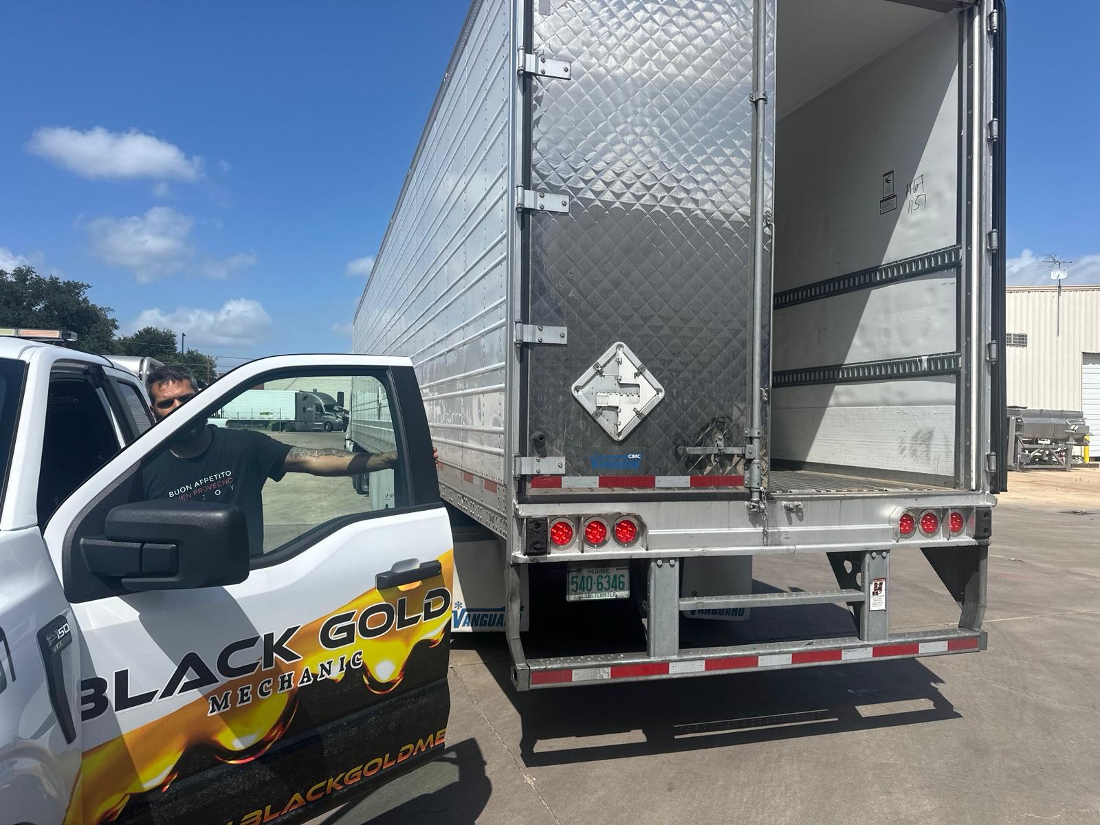 Truck mechanic inspecting commercial vehicle Austin TX