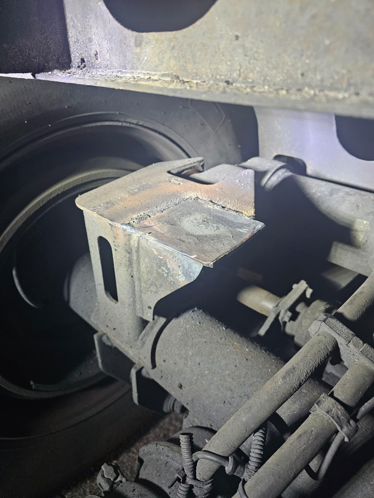 MIG welding on commercial truck frame roadside service